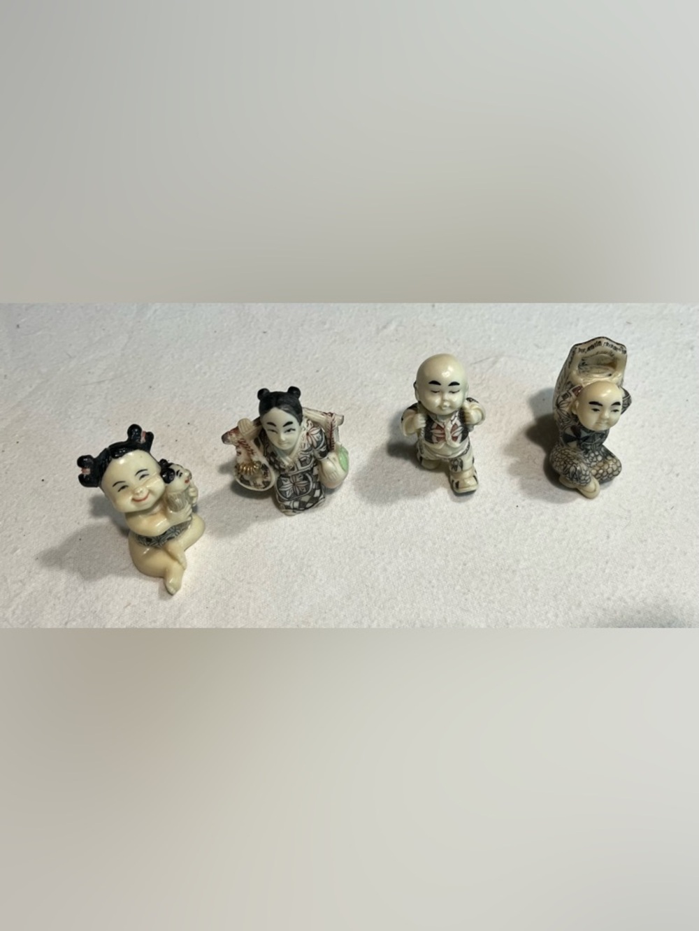 Ten Thousand Villages Asian Figurines Set of 4